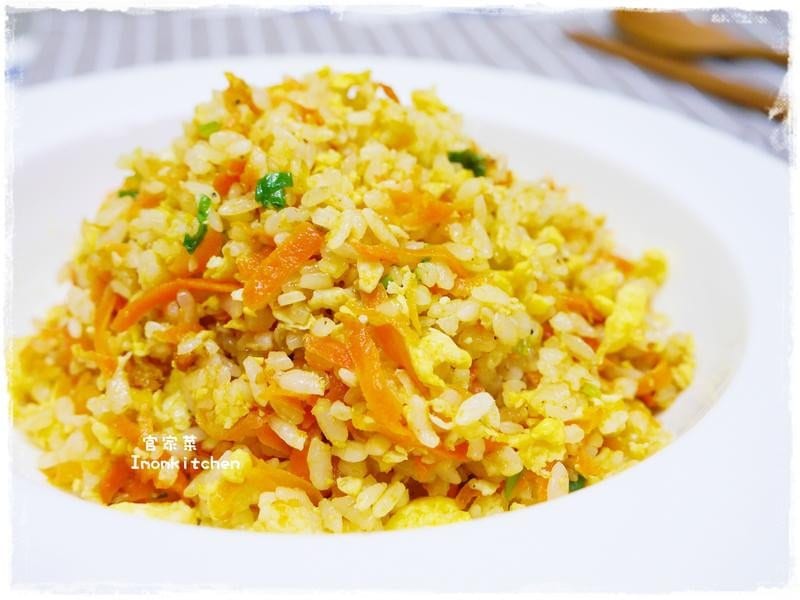 Rice fried with eggs and carrots